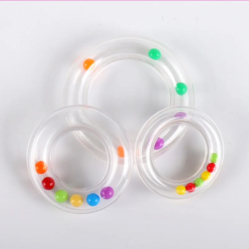 赤ちゃんと子供のためのプラスチック製のrattleラウンドリング,色付きのビーズ,ノイズメーカー,感覚トレーニング玩具,美しい教育