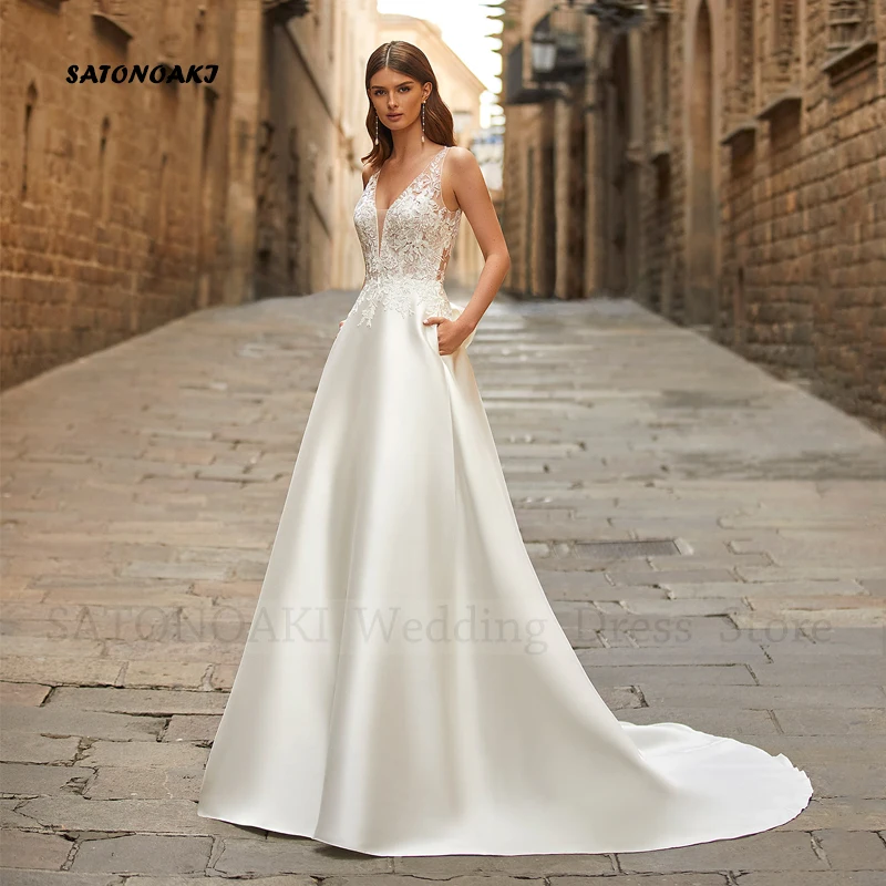 Abito da sposa in pizzo di raso con scollo a V Boho sexy elegante personalizzato avorio con fiocco tascabile per le donne Appliques A-Line Abiti da sposa