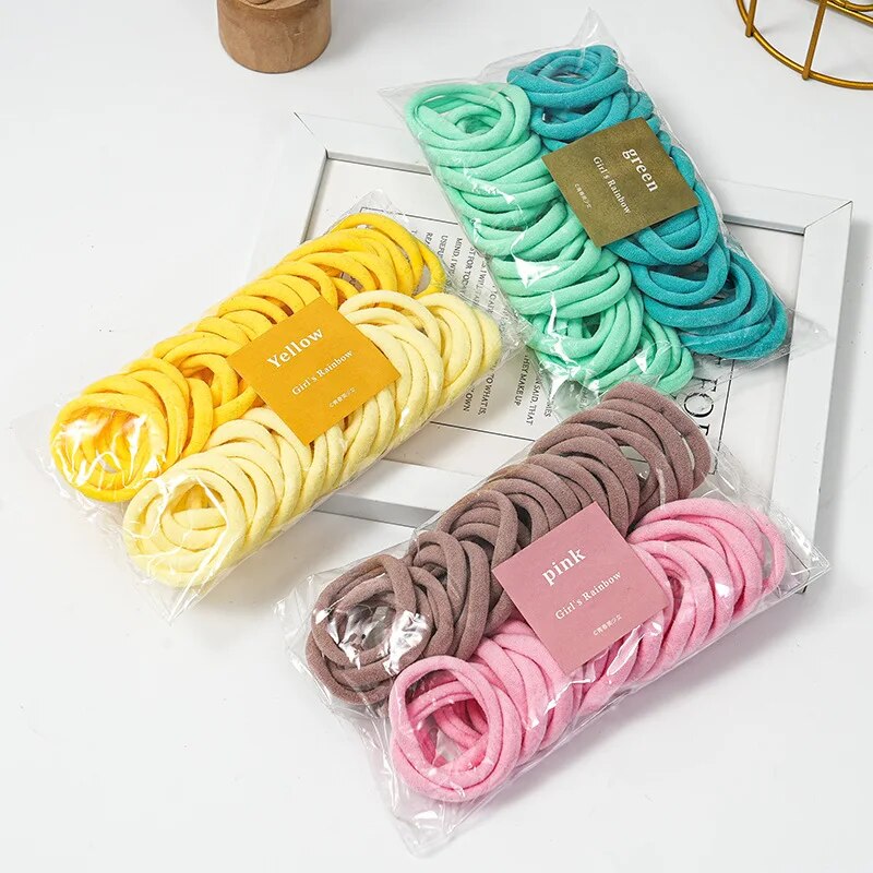 50 ชิ้นชุด Dual สีโฟร์ซีซั่นยืดหยุ่นสูงไม่มีรอยต่อเชือกผมเรียบง่ายและทนทานแฟชั่นหนัง Band Soft Knitt