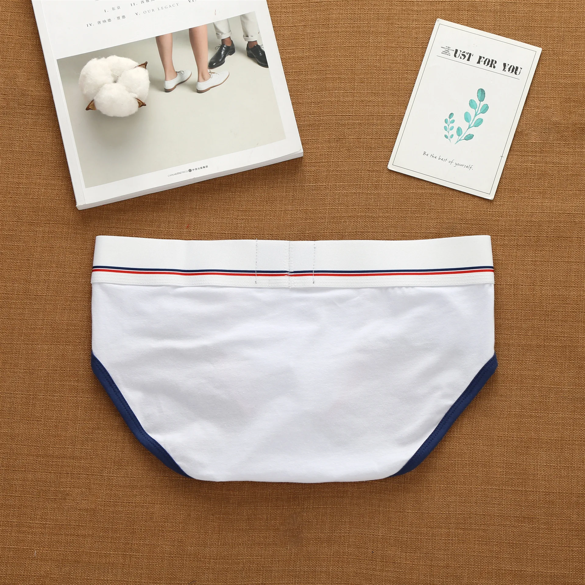 Calzoncillos elásticos de tendencia de moda de cintura baja de algodón puro con letras coreanas para hombre