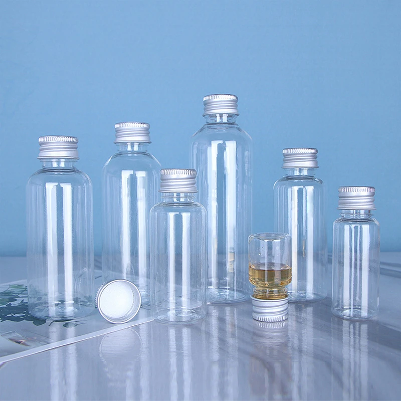 50 Uds 5ml 10ml 30ml 50ml 100ml botella de plástico tapa de aluminio botella de muestra de loción transparente contenedor cosmético vacío para viaje