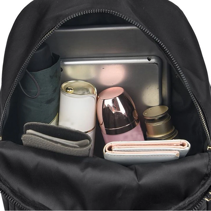Mochila de mujer de gran capacidad, confeccionada en tejido duradero, con cierre de cremallera, adecuada para viajes, fiestas y compras.