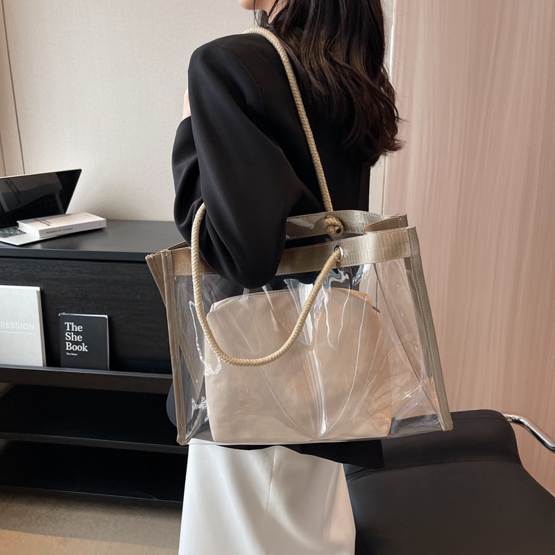 Trend ige transparente Einkaufstasche mit weiblichem Nischen design, einfache und wasserdichte Verbund tasche mit einer Schulter und großer Kapazität