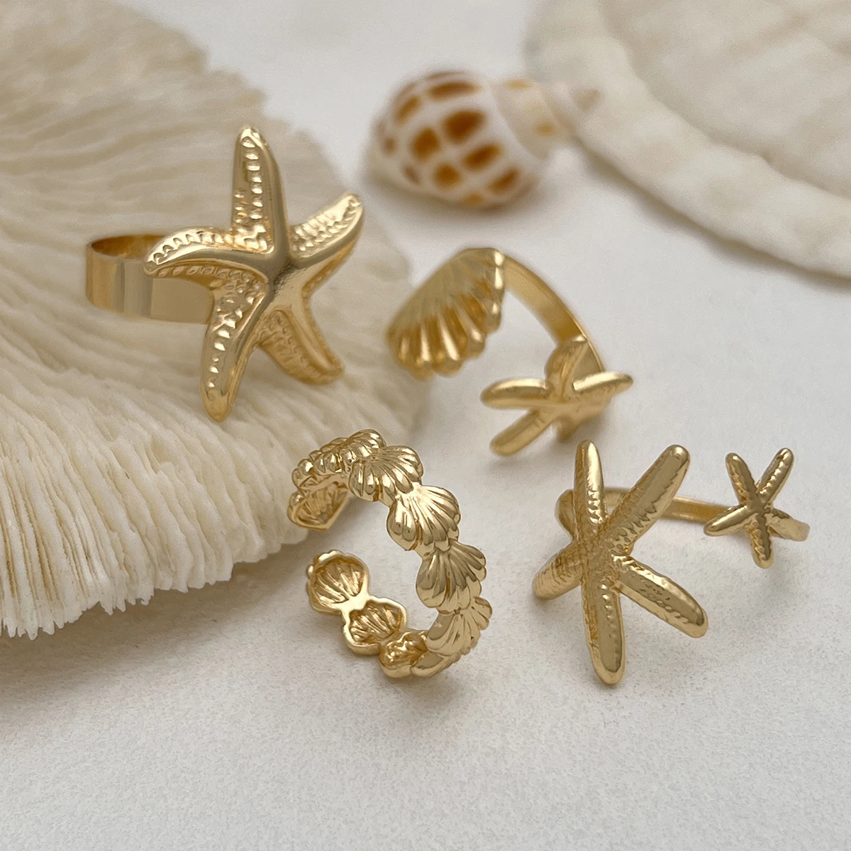 SHIXIN-Anillos abiertos ajustables con forma de estrella de mar para mujer, sortija geométrica de Color dorado, accesorio de joyería de playa de verano, 4 unidades por juego