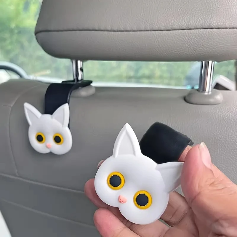 Ganchos para reposacabezas de asiento de coche con diseño de gato de dibujos animados en 3D, organizador Universal de almacenamiento de vehículos para bolsos, monederos, abrigos, 2 uds.