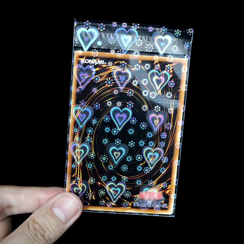 Fundas para tarjetas láser de papel de aluminio en forma de corazón, bolsa de almacenamiento transparente para juegos de Tarot, Protector de tablero YGO, funda protectora para tarjetas comerciales, 100 Uds.