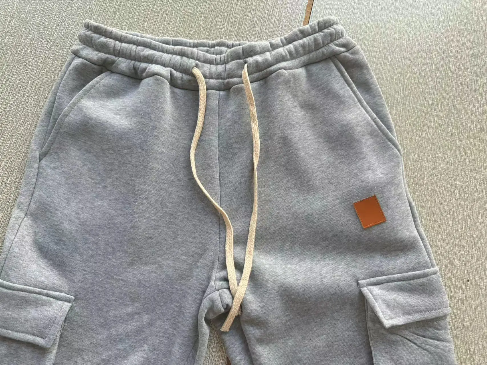 ผู้ชายกางเกงผ้าฝ้าย Multi-Pocket Micro-Elastic กีฬา Casual กางเกงฟิตเนส Joggers ขนแกะอุ่นกางเกงผู้ชายกางเกง