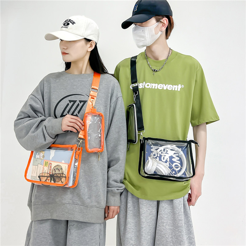 แนวโน้ม PVC โปร่งใสไหล่กระเป๋าสะพายข้างสีชมพูสีส้มขนาดเล็กความจุกันน้ํา Street กระเป๋าสะพายสตรีกระเป๋าลําลองผู้ชาย