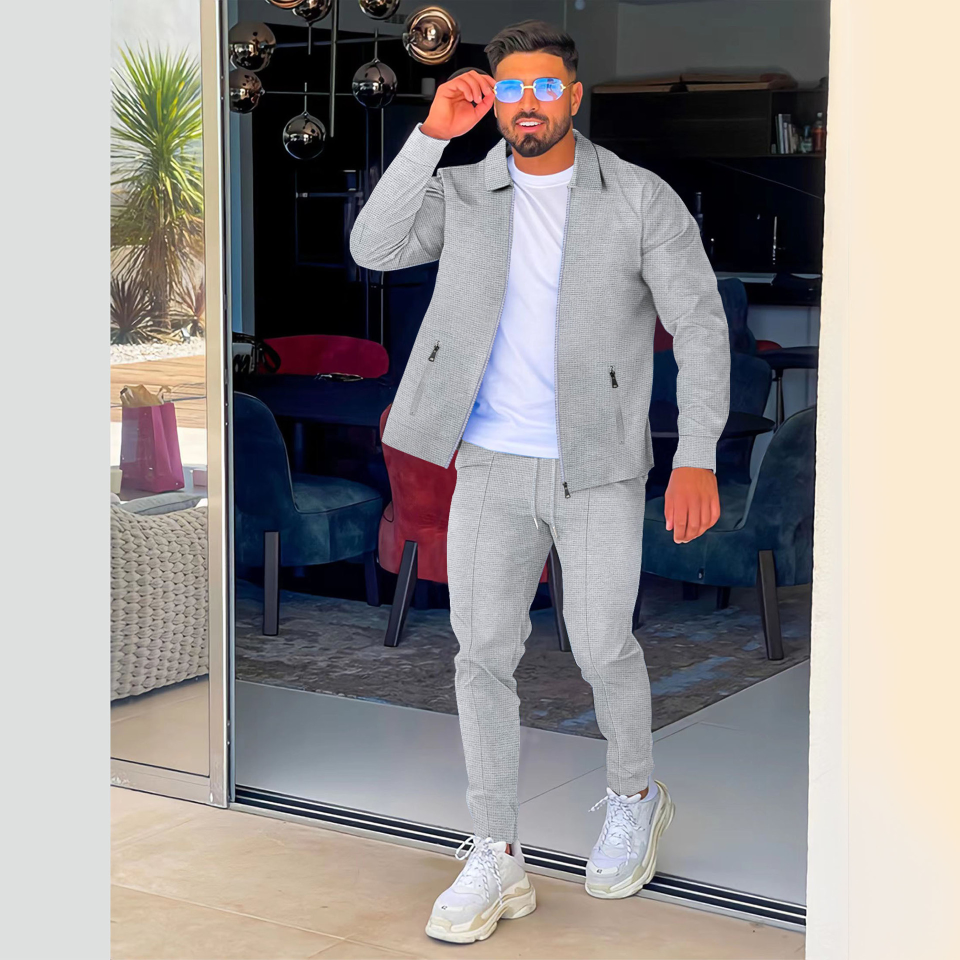 2023 AliExpress Amazon transfronterizo primavera y otoño cremallera bolsillo solapa tendencia chaqueta pantalones traje deportivo de calle para hombres