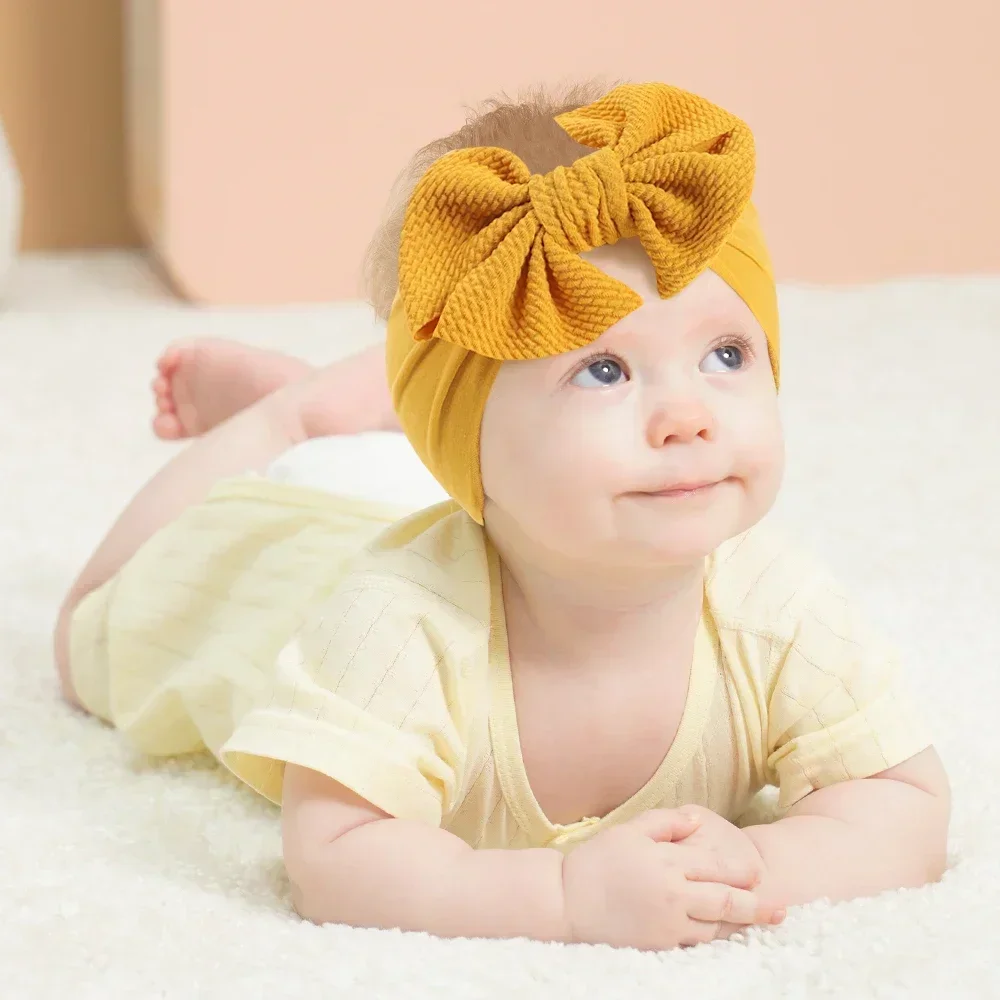 1 Uds. Diadema elástica para bebé, lazos grandes y encantadores, banda ancha para la cabeza, pañuelo suave para recién nacidos, diadema de Color sólido, accesorios para el cabello para bebé
