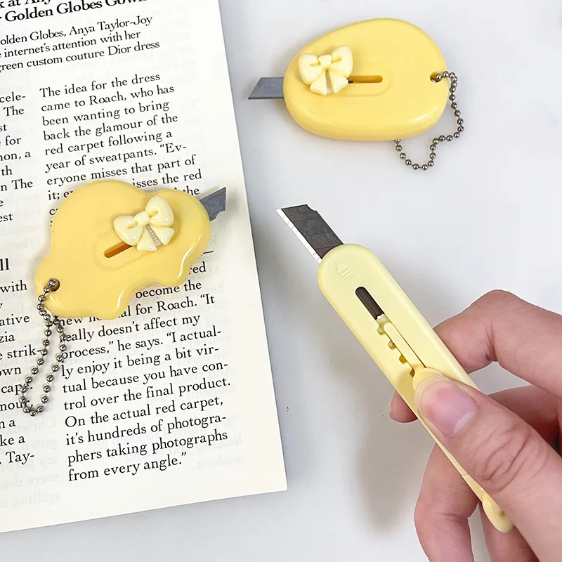 Mini couteau utilitaire d'art à nœud jaune mignon, couteau à papier, couteau rétractable pour déballage de paquets Express, papeterie cadeau
