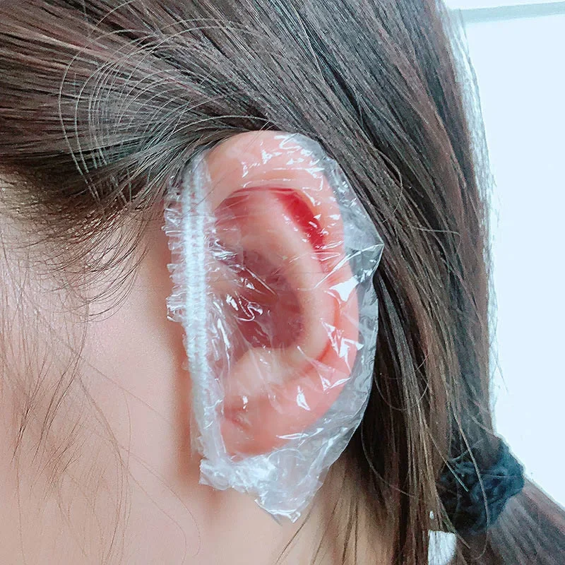 300 Uds. Orejeras desechables Unisex para peluquería orejeras impermeables transparentes protección para los oídos orejeras para ducha de baño accesorios de limpieza