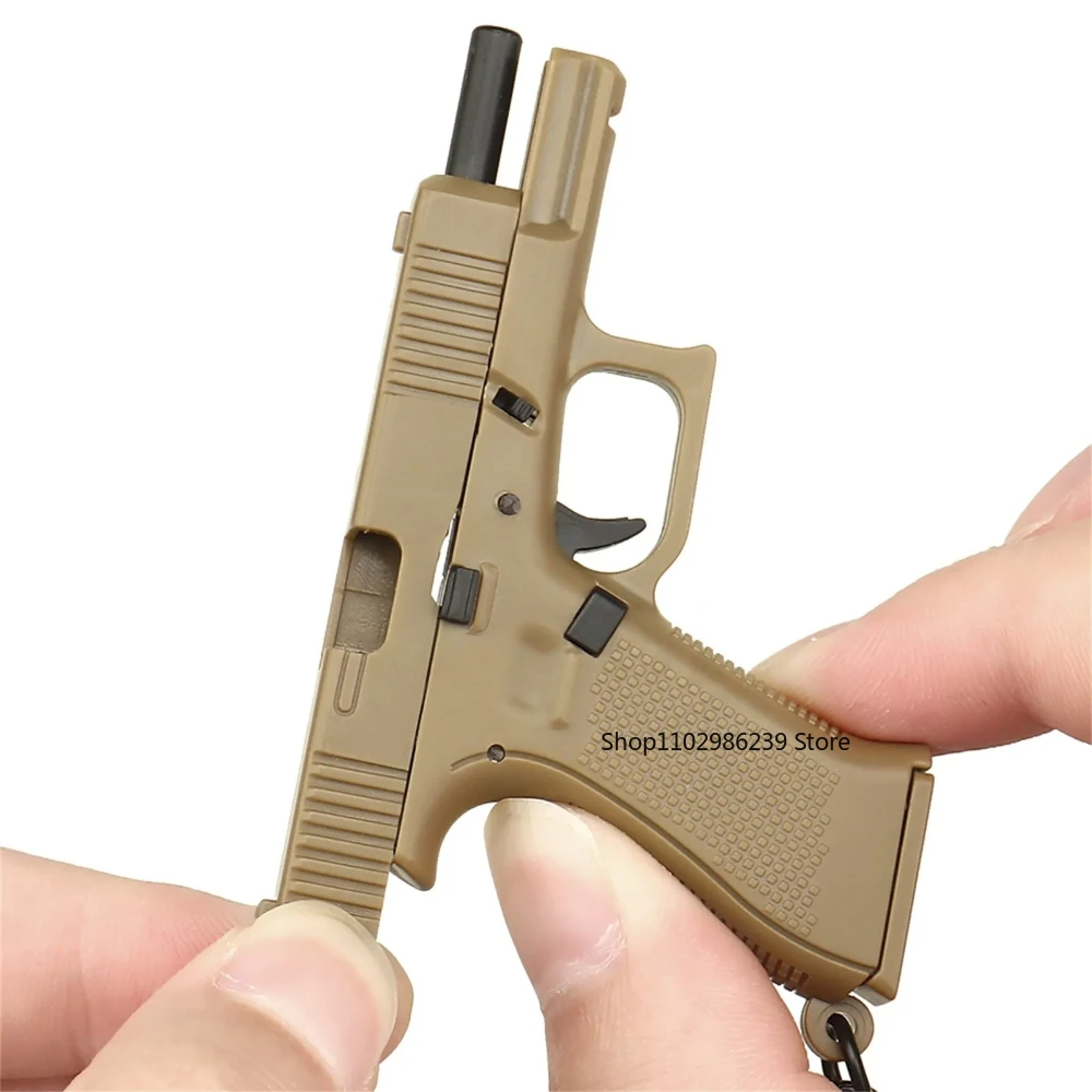 Mini llavero G45 con forma de pistola, llavero táctico, modelo realista, revista extraíble, modelo de pistola, regalos para cumpleaños