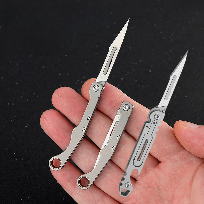 Nuevo Mini cuchillo quirúrgico plegable de aleación de titanio, cuchillo EDC portátil para acampar al aire libre, viene con 10 Uds de cuchillas gratis
