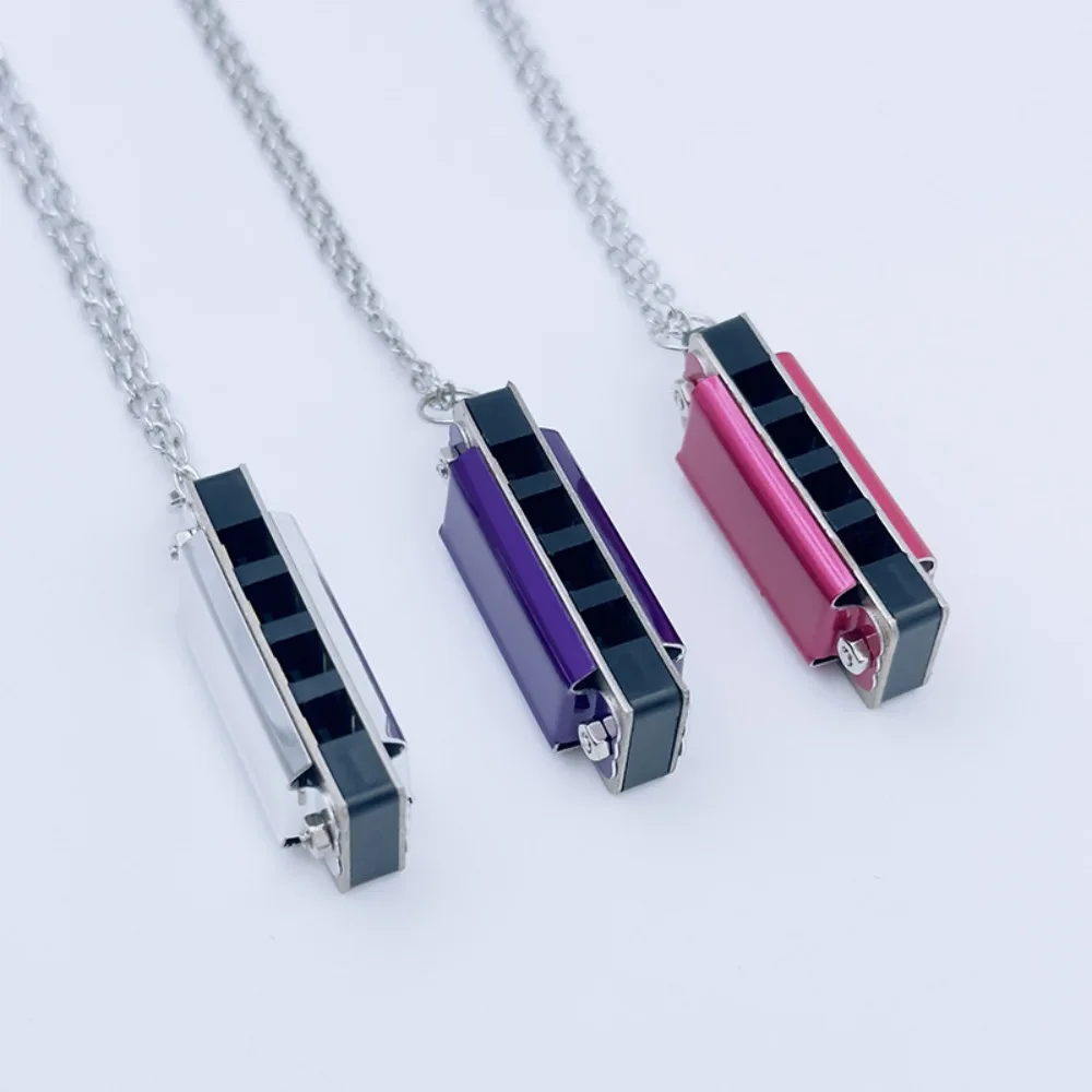 Collar de 4 agujeros y 8 tonos para niños, Mini armónica de Metal, juguete musical para niños, instrumento Musical de viento de madera para órgano bucal de alta calidad