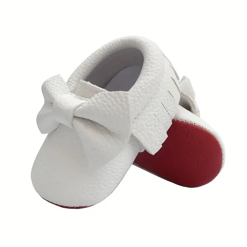Bowknot หนังรองเท้าเด็กทารกแรกเกิดเด็กผู้หญิงรองเท้า Multicolor เด็กวัยหัดเดินสีแดง Soft Sole Anti-SLIP First Walkers ทารกแรกเกิด MOCCAS