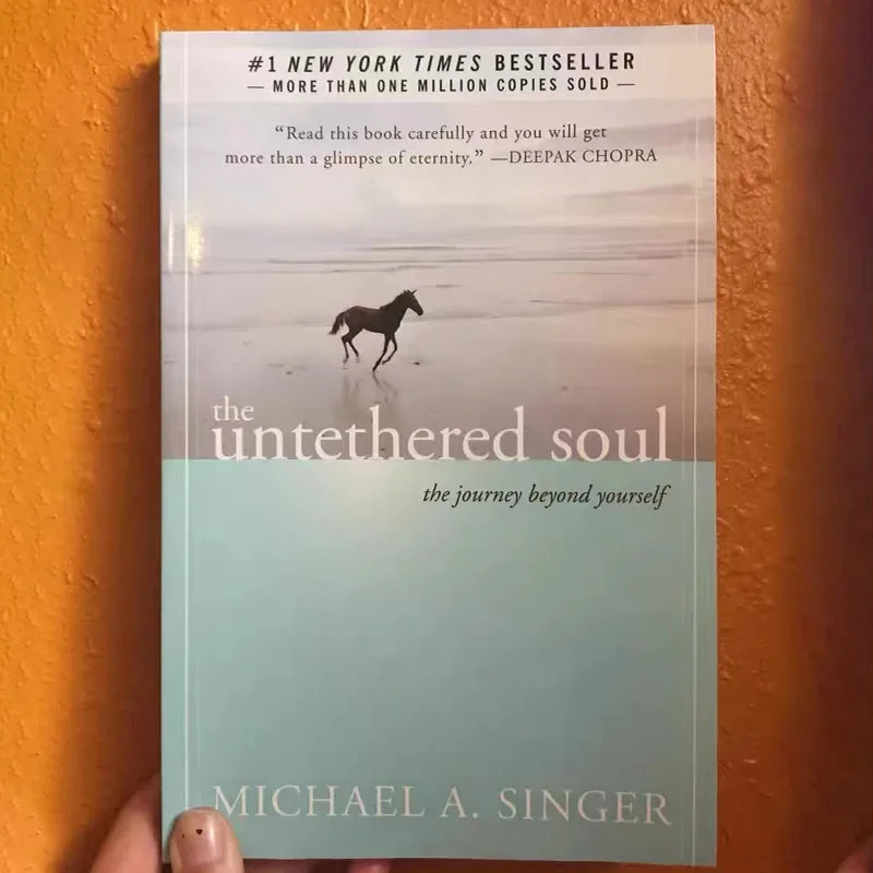 The Untethered Soul โดย Michael A. นักร้อง The Journey Beyond Yourself นวนิยาย # หนังสือปกอ่อนขายดีของ New York Times 1 เล่ม