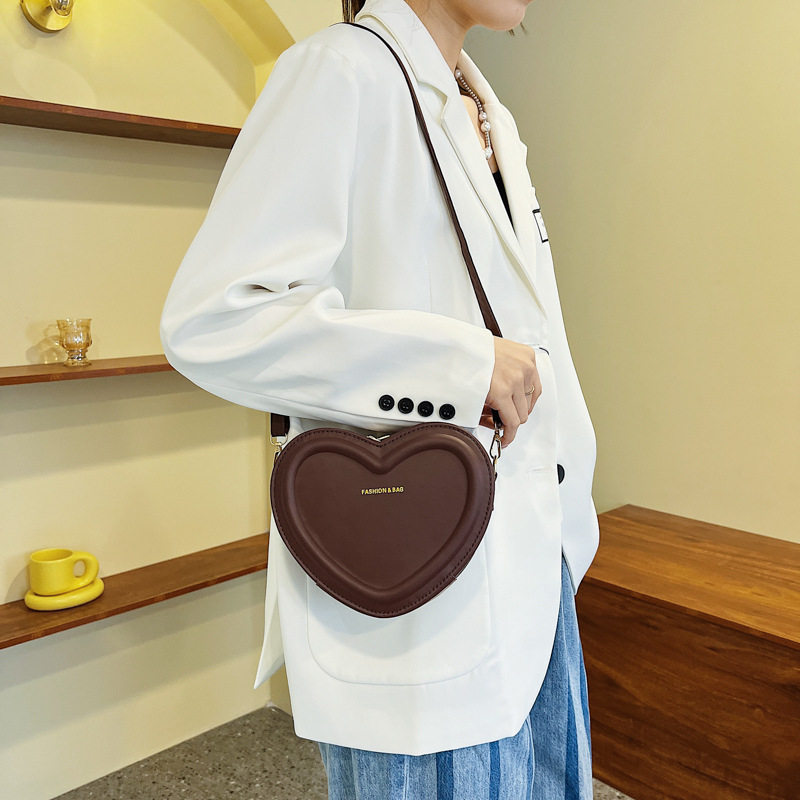 ファッションハート型キャンディーカラー小肩スリングバッグ女の子用puレザージッパー女性用カジュアルクロスボディバッグ