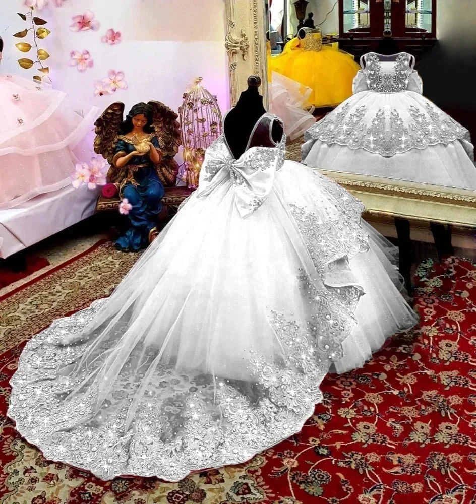 2024 ใหม่ดอกไม้สาวชุดสําหรับงานแต่งงานTulle Puffyลูกไม้ประดับด้วยลูกปัดแขนกุดกับโบว์เจ้าหญิงGownsชุดวันเกิด