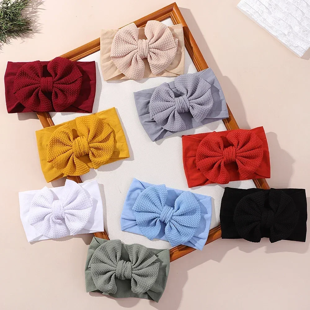 1 Uds. Diadema elástica para bebé, lazos grandes y encantadores, banda ancha para la cabeza, pañuelo suave para recién nacidos, diadema de Color sólido, accesorios para el cabello para bebé