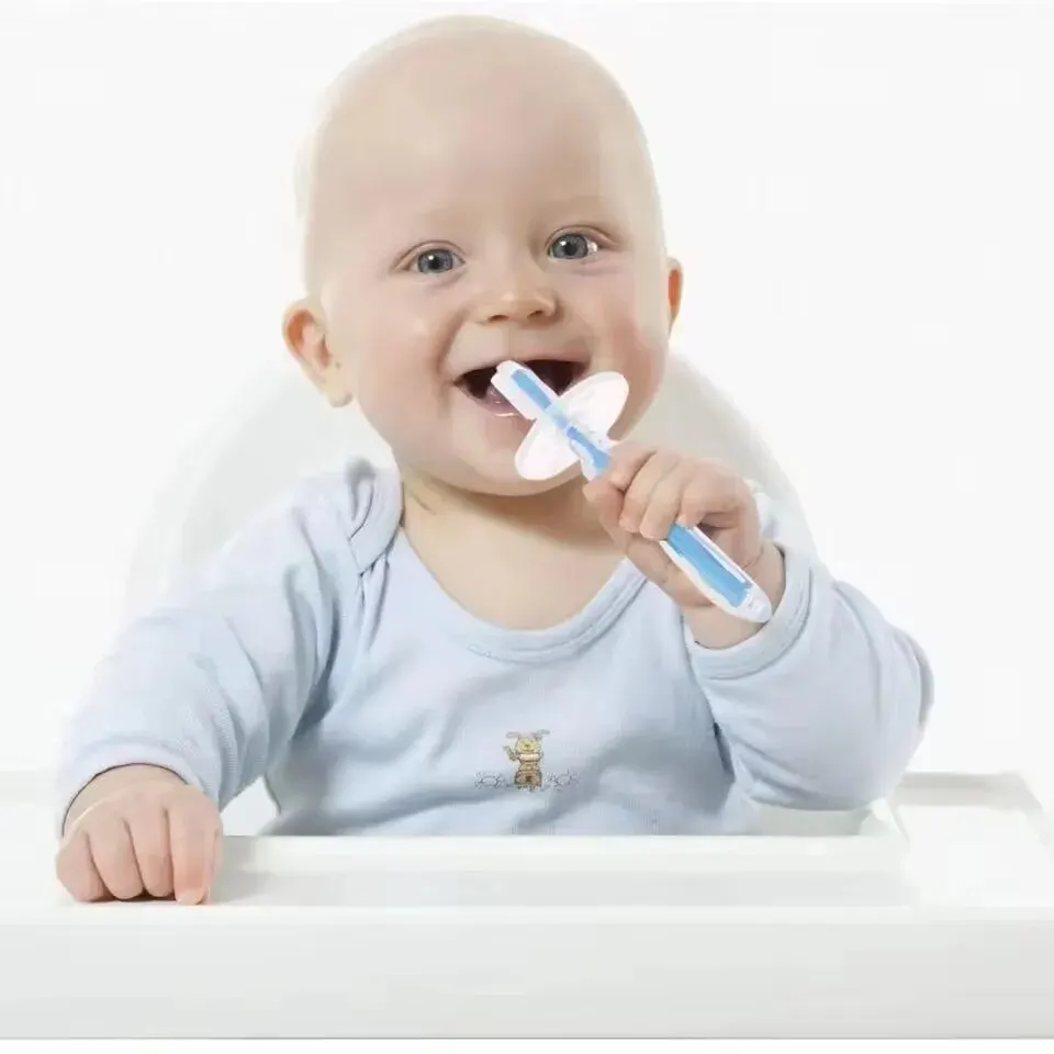 1 peça 100% grau alimentício alça macia flexível mordedor de borracha de silicone treinamento infantil escova de dentes para bebê preço de fábrica