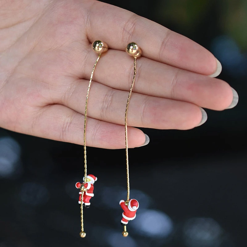 Nuevo diseño asimétrico copo de nieve bota de Navidad sombrero pendientes colgantes para mujeres en movimiento Santa Claus pendiente largo con borla joyería de fiesta