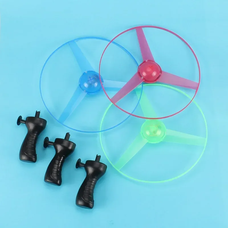 1pc Pull Draht Glow UFO Lustige Spinning Flyer Leuchtende LED Licht Griff Top Spielzeug für Kinder Geschenke Outdoor Sport eltern-kind-Spiel