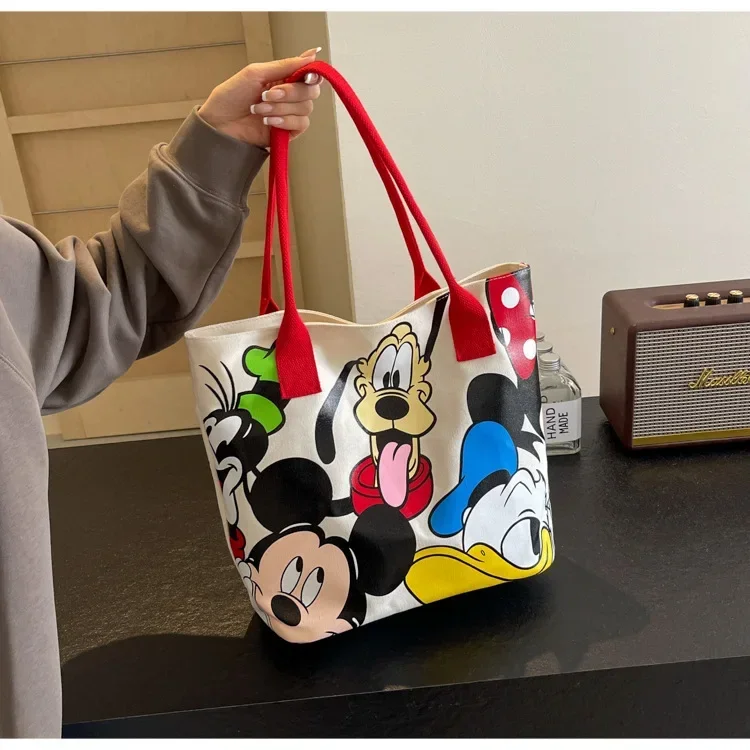 Bolso de lona versátil de gran capacidad con dibujos de Mickey para mujer, bolso de mano informal y versátil, bolso de clase para estudiantes
