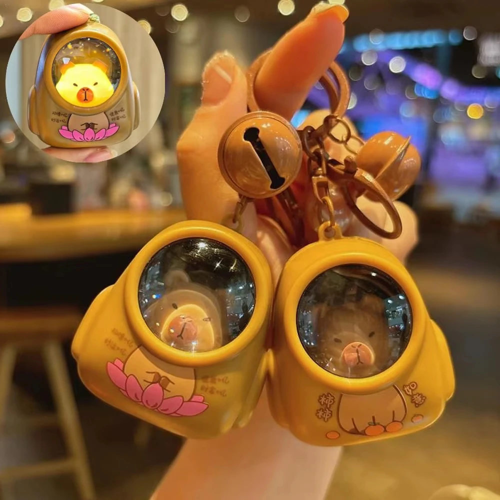 LLavero luminoso Kapibala creativo, cápsula espacial de dibujos animados, llavero de capibara, colgante para mochila escolar, baratija, regalo para Amiga