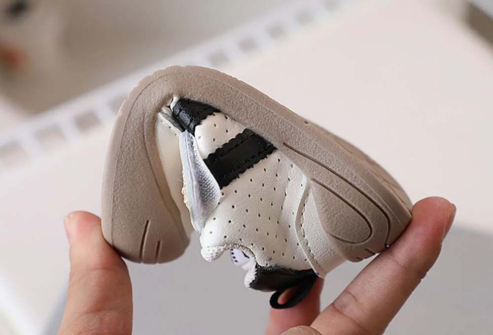 2025 แฟชั่นรองเท้าเด็กวัยหัดเดินสําหรับทารก PU หนังเด็กทารกรองเท้าผ้าใบ Soft-soled Ergonomics ทารกแรกเกิดกีฬารองเท้า First Step