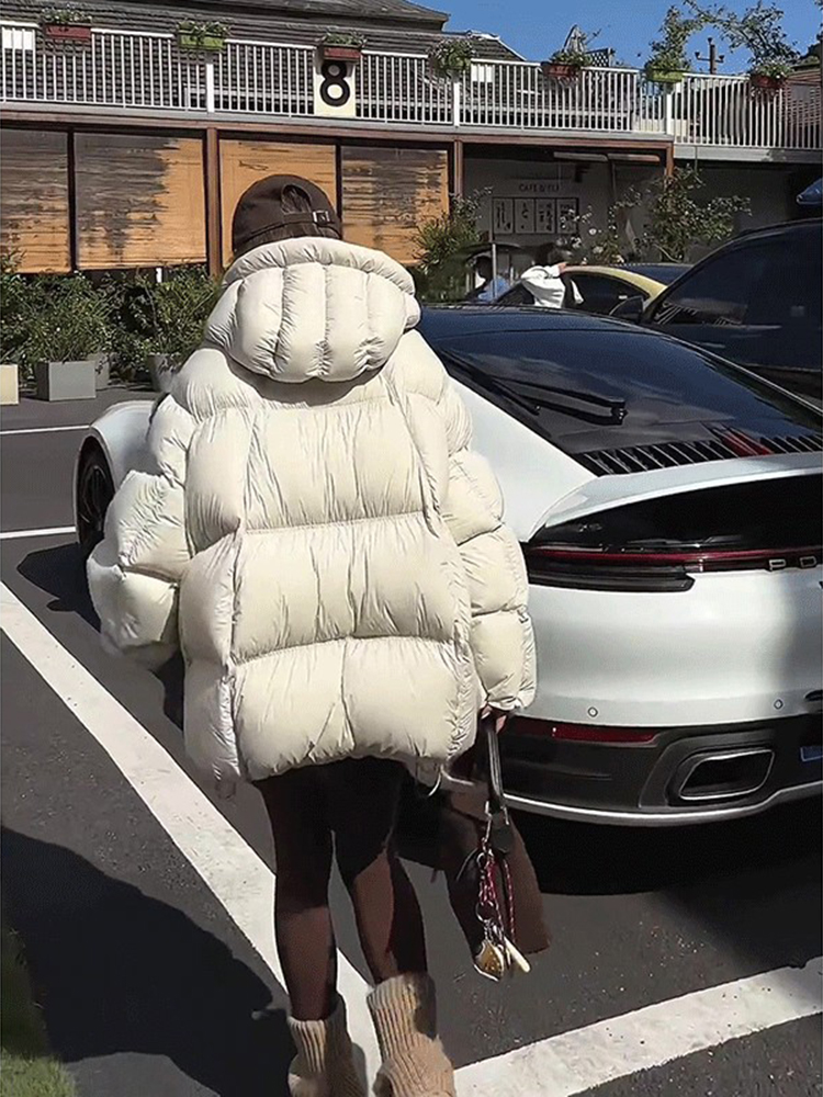 Nueva chaqueta acolchada de invierno para mujer, abrigo cálido grueso de plumón de pato blanco para mujer, abrigo con capucha grueso liso suelto de longitud media para mujer