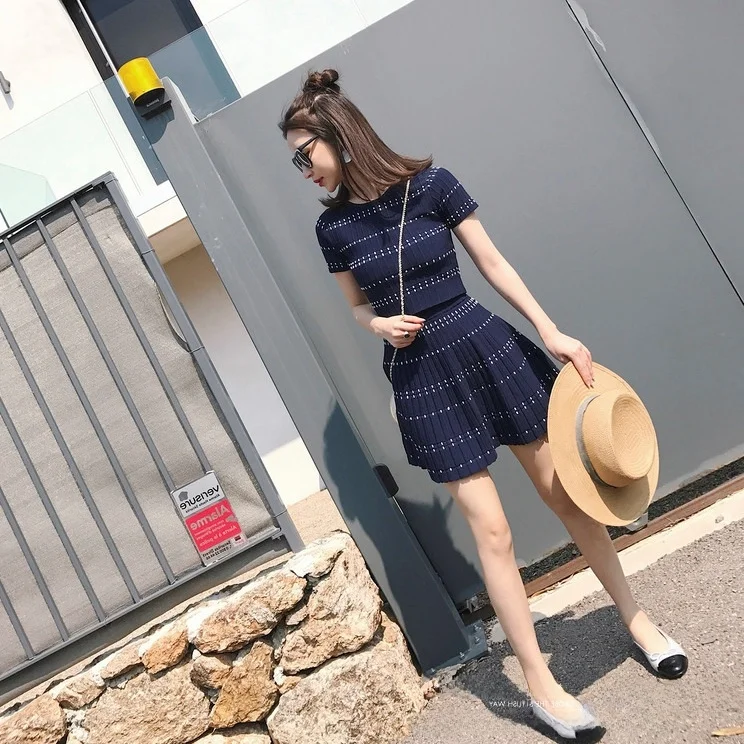 Conjunto e de dos piezas de manga corta para mujer, conjunto de falda y top profesional de moda Vintage, novedad de ve...