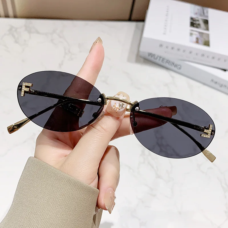 ยุโรปและอเมริกาแฟชั่นแว่นตากันแดดโลหะ Frameless