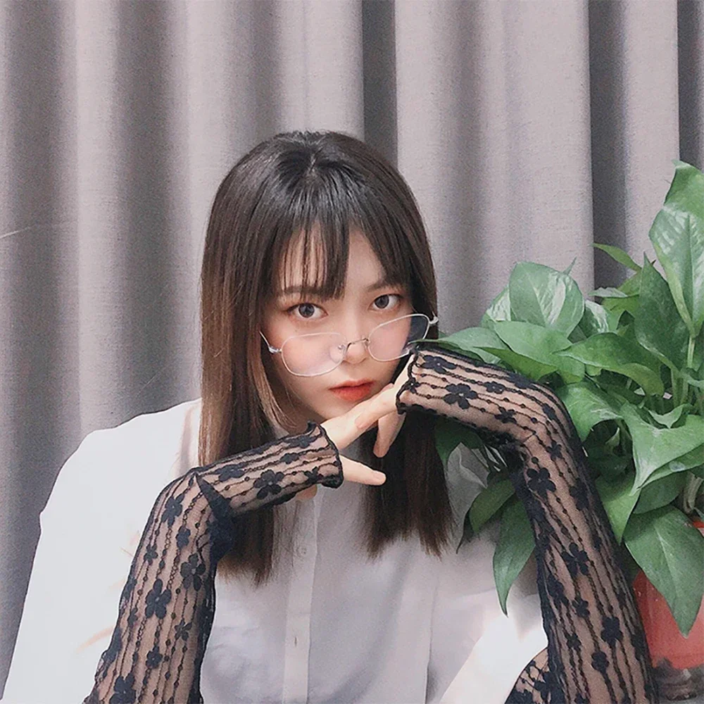 2 ชิ้นยาวตาข่ายลูกไม้ถุงมือ Hollow - Out Fingerless ถุงมือผู้หญิงแขนป้องกันแสงแดดกลางแจ้งหรูหราลูกไม้บางขี่จักรยานถุงมือยิม