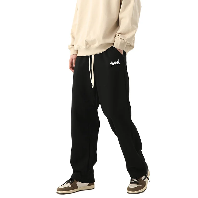 Pantalones para correr de pierna recta de color sólido para hombre, adecuados para deportes casuales como correr, gimnasio y actividades al aire libre.