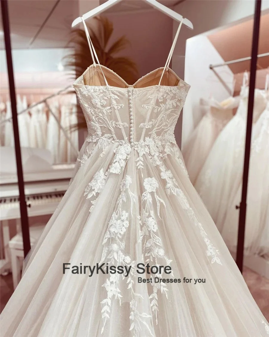 FairyKissy สปาเก็ตตี้เซ็กซี่สายรัดตาข่ายเปลือยดูผ่านสัมผัส Boning ชุดแต่งงาน Backless เจ้าหญิงลูกไม้ชุดเจ้าสาว
