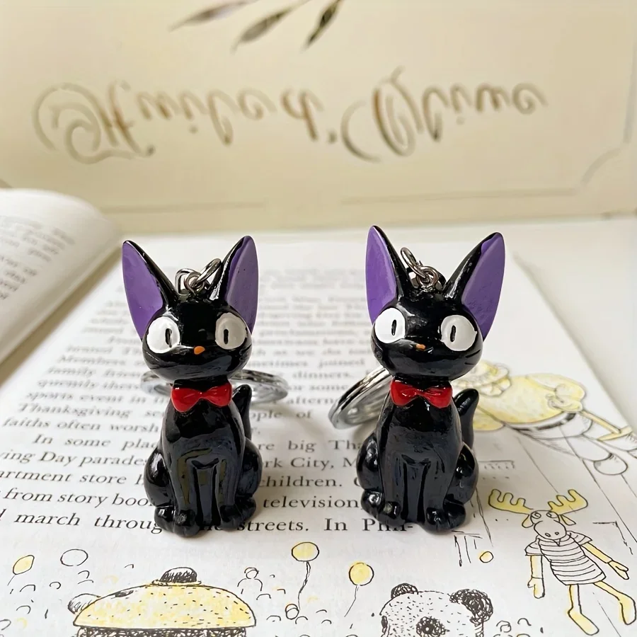 魅力的な黒猫キーホルダー - かわいいPVC製レディースファッションアクセサリー、バッグや鍵に最適、猫アクセサリー
