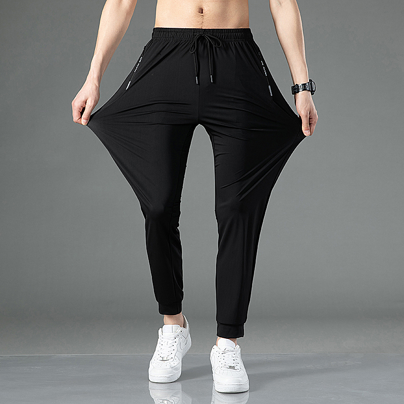 Pantalones de pierna ancha de pierna recta grande informales de seda de hielo de verano para jóvenes pantalones casuales sueltos deportivos de secado rápido con sensación de caída