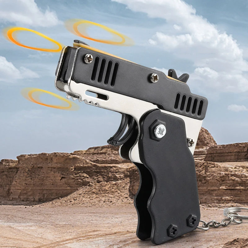 1PCS keychain gun 60 rubber bands rubber band gun Shooting Pistol Alloy Kid Outdoor Party metal gun gift boyfriend Gift Funny