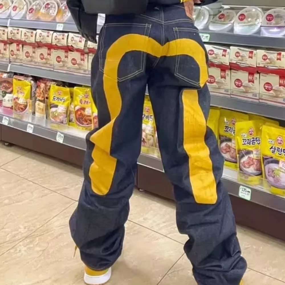 Vaqueros de hip-hop europeos y americanos para hombres y mujeres con estampado de pantalones de moda para las cuatro estaciones gótico Y2K high street primavera y verano