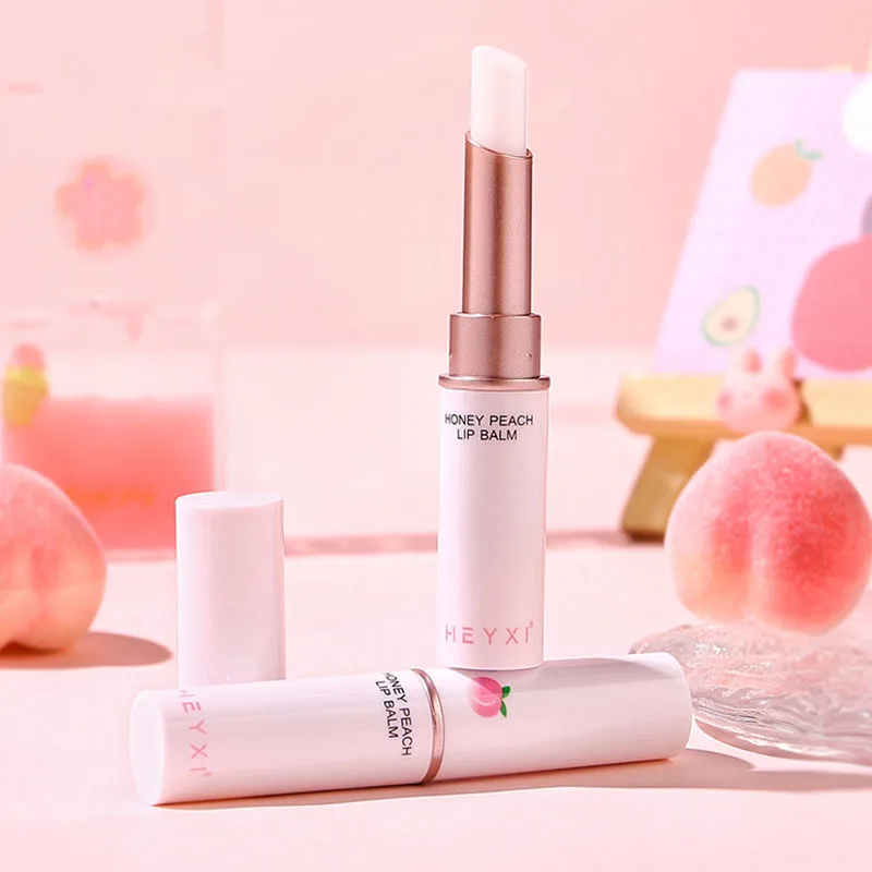 น้ําผึ้งพีช Lip Balm เปลี่ยนสีลิปสติกริมฝีปาก Plumper Moisturizing Hydrating Nourishing Beauty LIPS Skin Carae เครื่องสําอาง