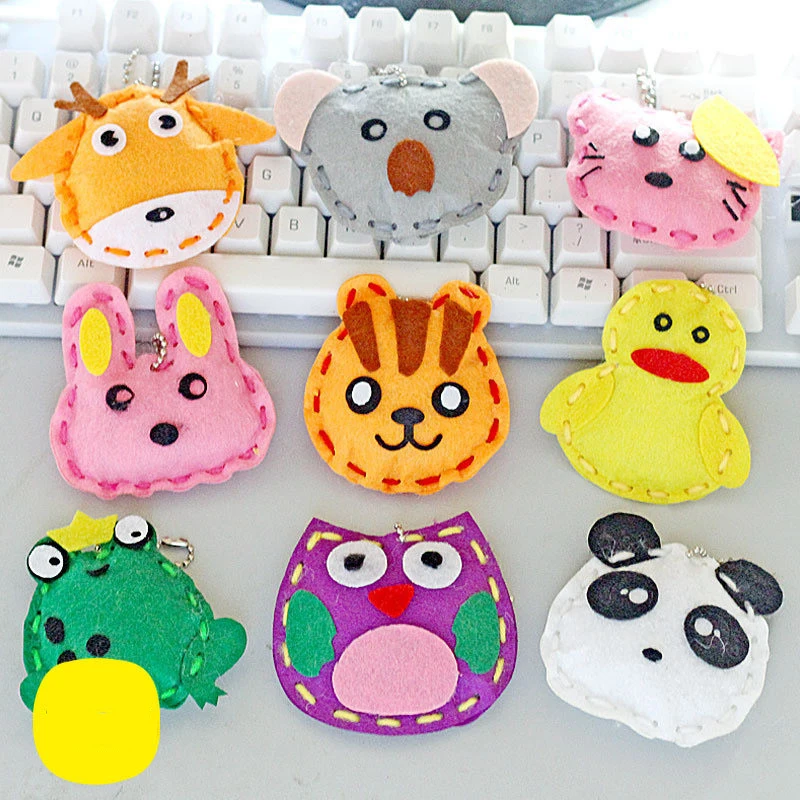 5 ชิ้นผ้าไม่ทอสัตว์สีชมพูกระเป๋าพวงกุญแจ DIY ทําด้วยมือของเล่นเด็กเด็กวันเกิดเครื่องประดับศิลปะหัตถกรรมชุดของขวัญ
