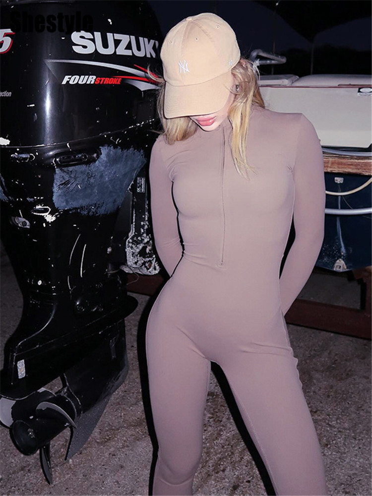 Shestyle Solidผู้หญิง 2025 ฟิตเนสBodycon JumpsuitซิปFly Mockคอออกกําลังกายเสื้อผ้าHipsterสีม่วงเซ็กซี่ยืดสไตล์