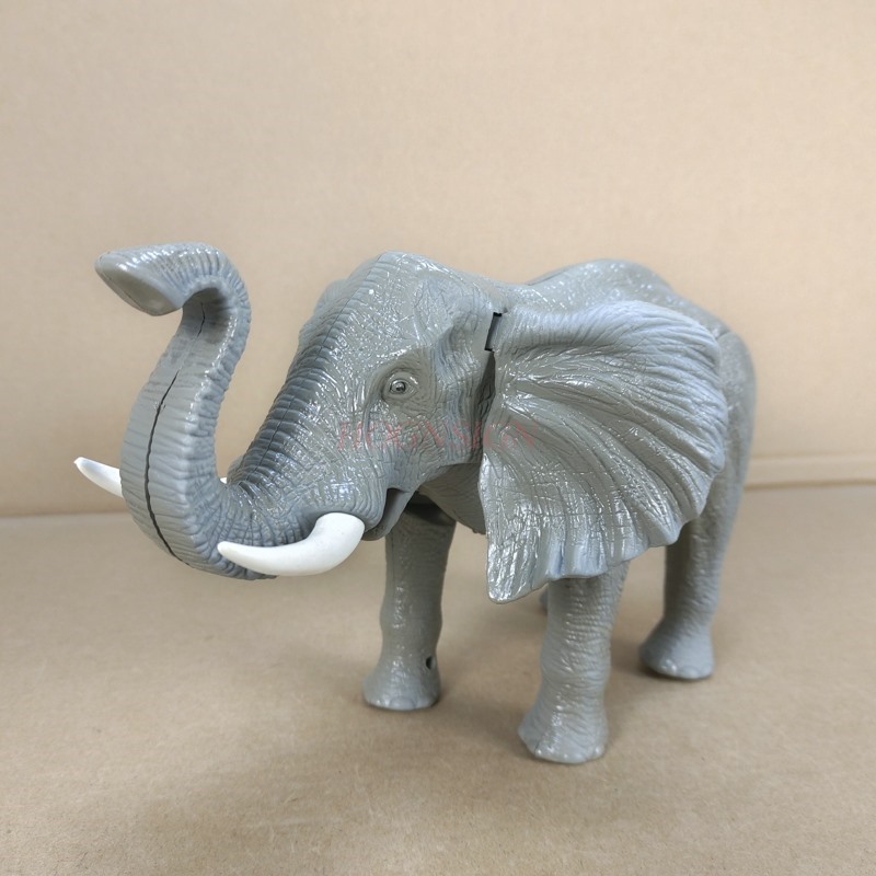 Juguete eléctrico de plástico para niños, modelo de elefante que llora, puede caminar