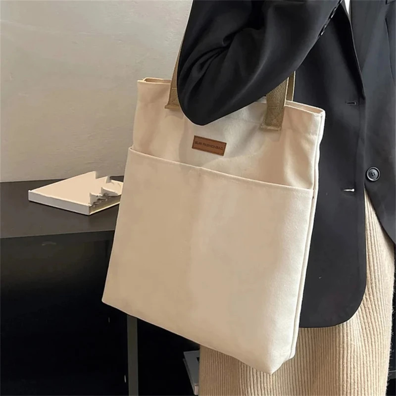 1 peça de bolsa feminina de grande capacidade lona linha de costura high-end sensação bolsa conveniente saco de deslocamento