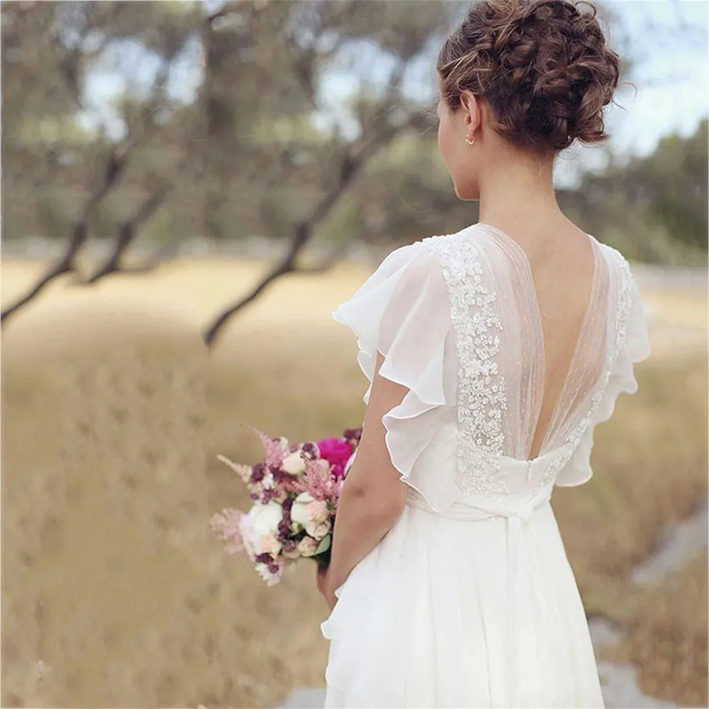 Abiti da sposa Boho personalizzati con scollo a V in chiffon A Line maniche corte Backless Piano Lunghezza Ruffles Beach Abiti da sposa Bohemian