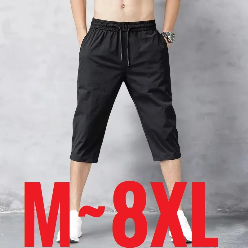 Pantalones cortos de 3/4 de longitud para hombre, pantalones cortos de verano de seda helada de secado rápido, Bermudas largas de pantorrilla para hombre, pantalones cortos elásticos de nailon de talla grande para playa