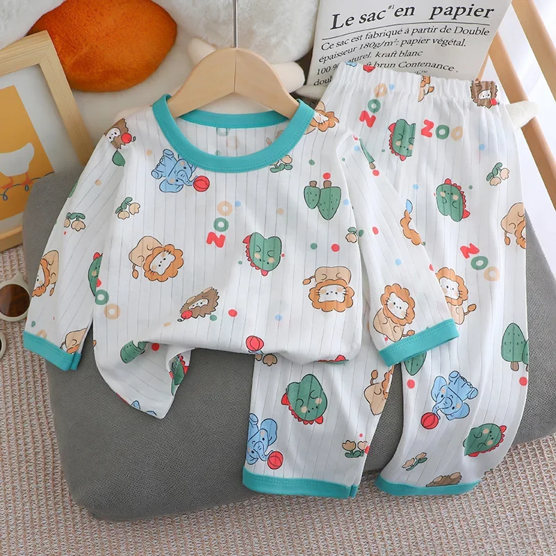 2024 ニューキッズボーイズガールズ夏の純粋な綿薄いパジャマかわいい漫画プリント長袖 Tシャツトップス + パンツベビー服セット