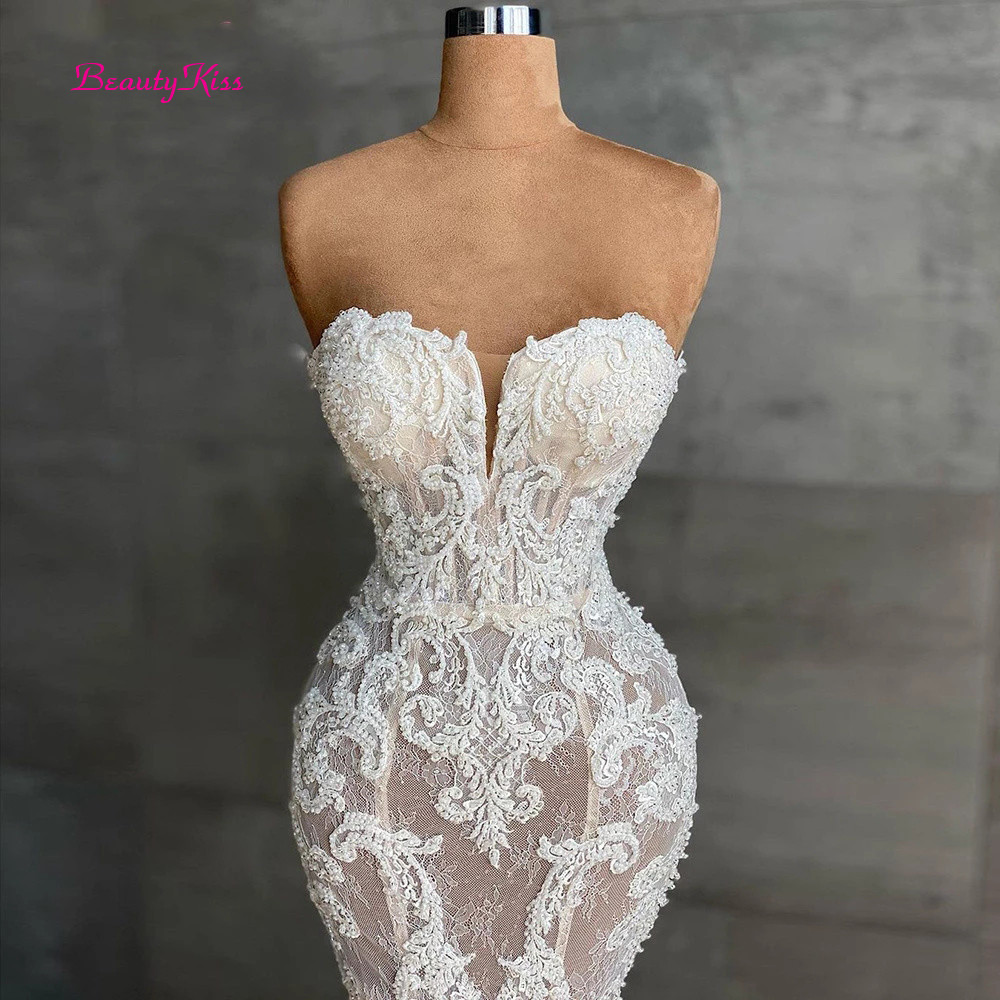 นางเงือกชุดแต่งงานลูกไม้คริสตัลหรูหราลูกปัดชุดเจ้าสาว Sweetheart Strapless แขนกุด Appliques ชุดแต่งงานสําหรับเจ้าสาว