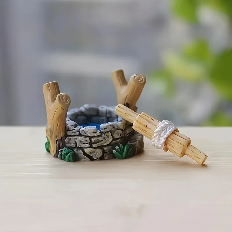 Una statua in miniatura del pozzo del paese delle meraviglie - Collezione in resina fatta a mano con micro decorazione paesaggistica